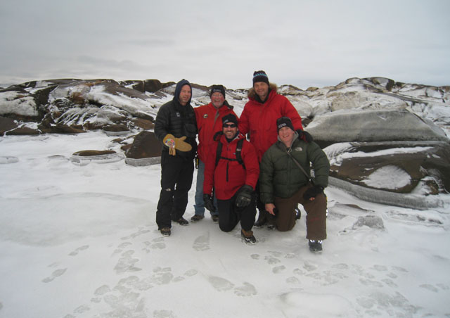 In Churchill, Ben gathers on the ice with some of the field staff. If you look closely you’ll see polar bear tracks!