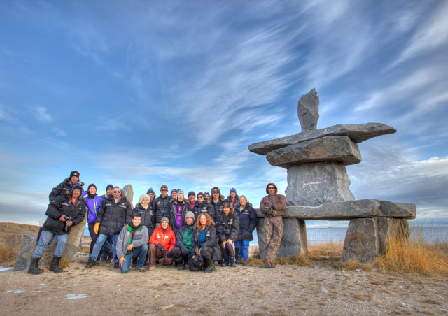 Group photo at the famous inukshuk on the edge of the Hudson Bay, Churchill