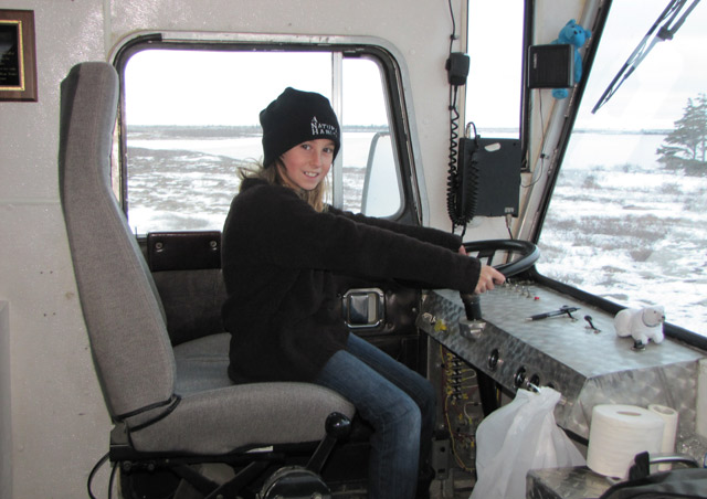 My Daughter, Grace, behind the wheel of a Polar Rover.