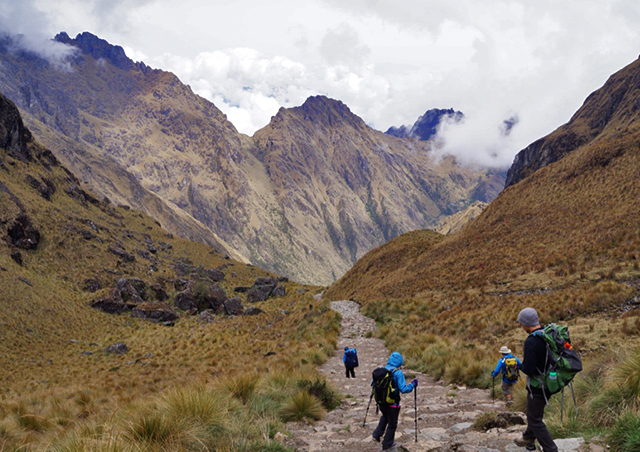 Hiking down from the highest point along the Inca trail—Warmiwanusca, 'Dead Woman's Pass.'