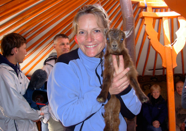 Here I am inside a traditional Mongolian ger, holding a baby goat that’s just a few days old. 