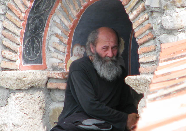 This Georgian monk sits in contemplation outside his monastery in Telavi. 