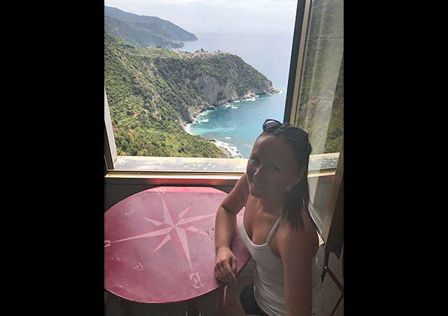 Taking a break along the Cinque Terre hiking trail in Italy