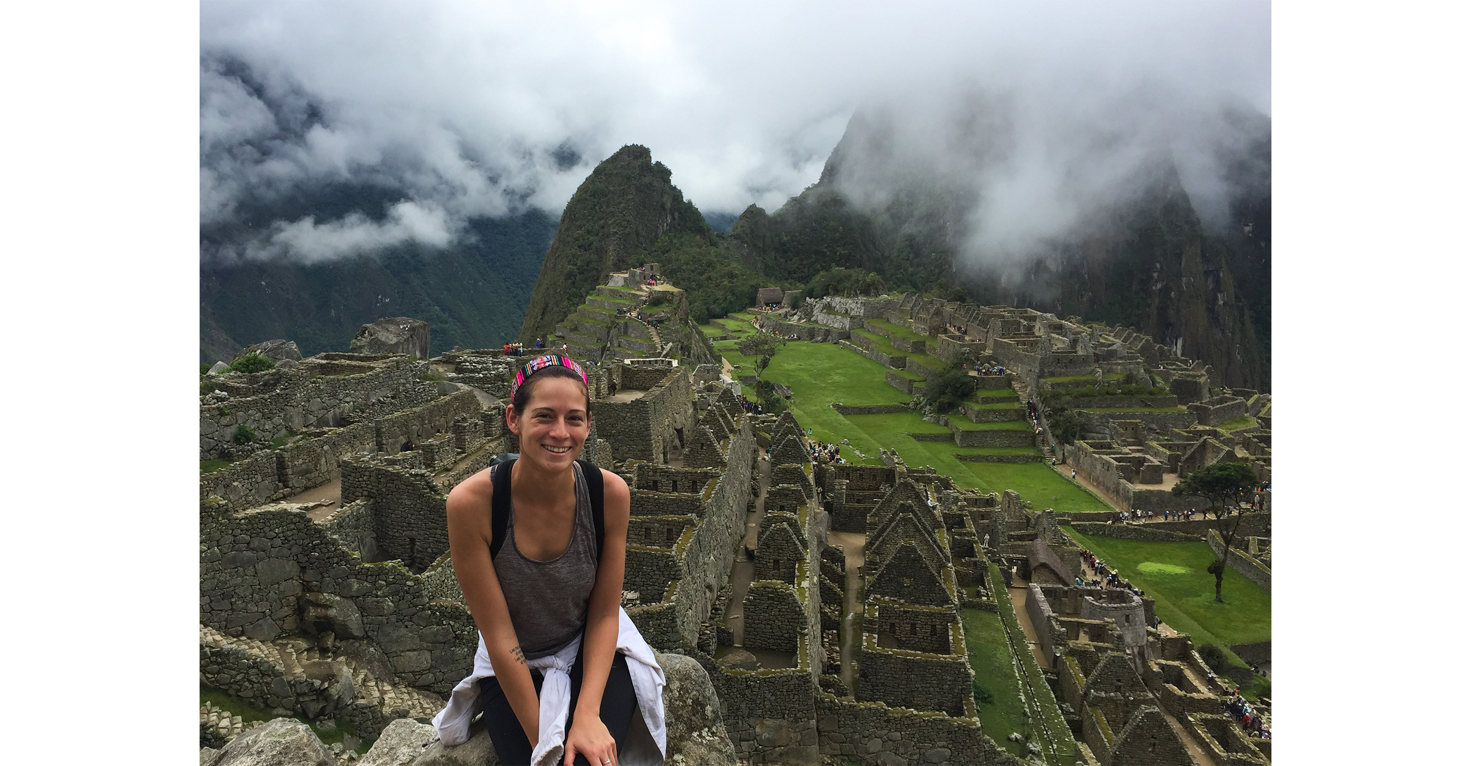Visiting the ancient Incan citadel of Machu Picchu in Peru.