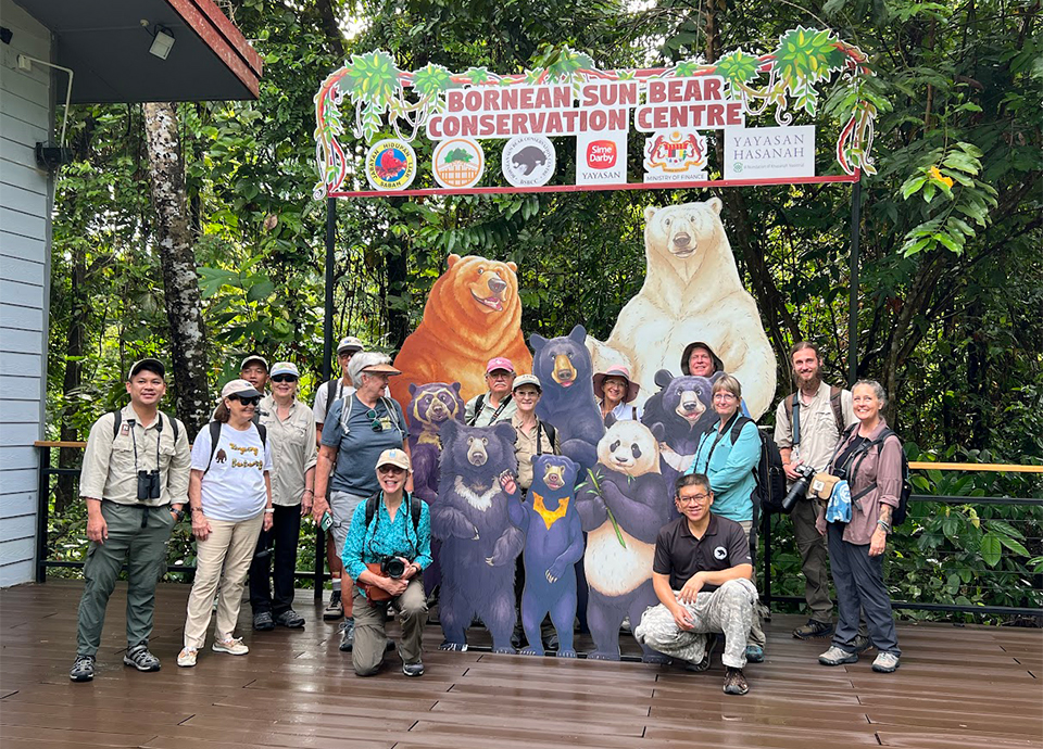 New friends in front of the Sun Bear Conservation Centre in Borneo.