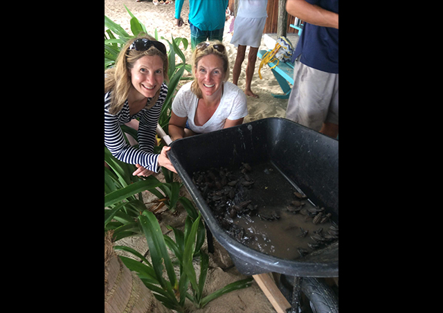 With her sister and sea turtles in Belize.