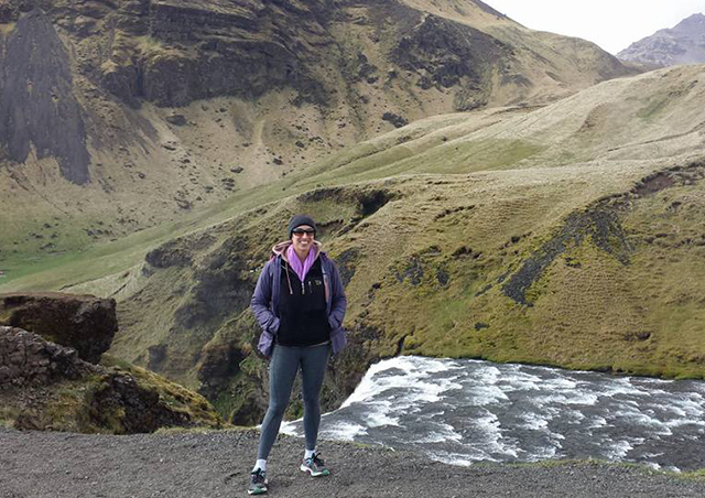 Hiking in Iceland at the top of the Skogafoss Waterfall.