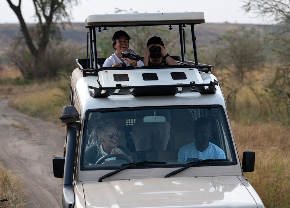 Having the best day on a safari drive with our guide Sula and other guests. Ishasha Sector of Queen Elizabeth National Park in Uganda, during the Great Uganda Gorilla Safari trip