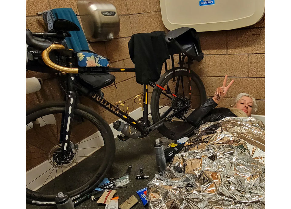 The luxuries of ultra-endurance bike racing: snoozing on the bathroom floor of a rest stop