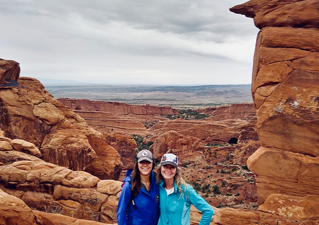 Hiking through Arches National Park in Utah on a cool and cloudy day.