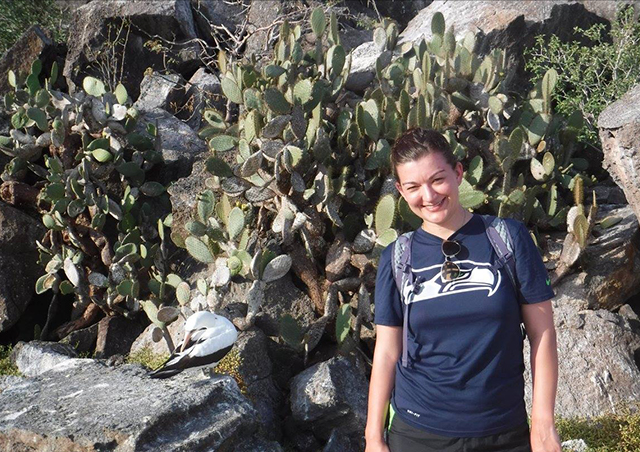 Posing with a nazca booby in the Galapagos.