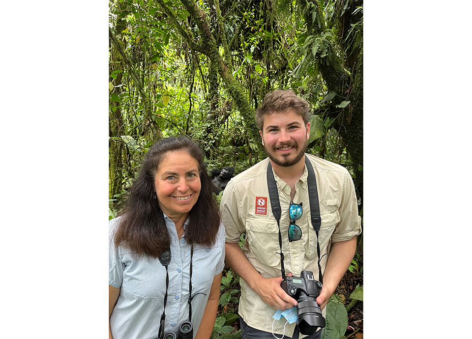 Gorilla tracking is my all-time favorite wildlife experience.  Being so close to these magnificent creatures is life changing.  I always wanted to take my son Kyle and finally it was possible to do so, you can just see a glimpse of the silverback behind us.  He loved it as much as I did!