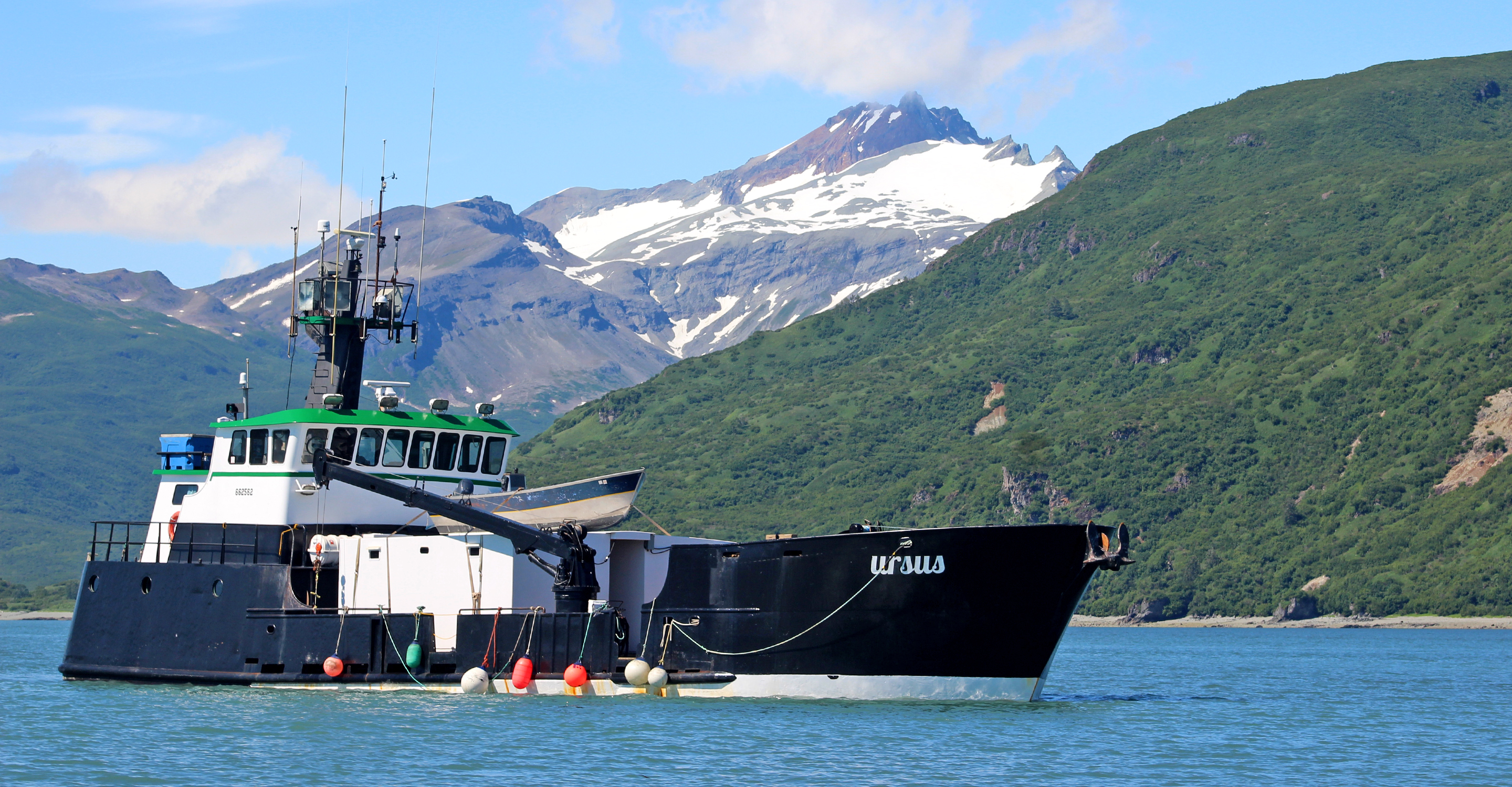 The Natural Habitat Ursus boat anchors offshore of Katmai National Park, Alaska, USA