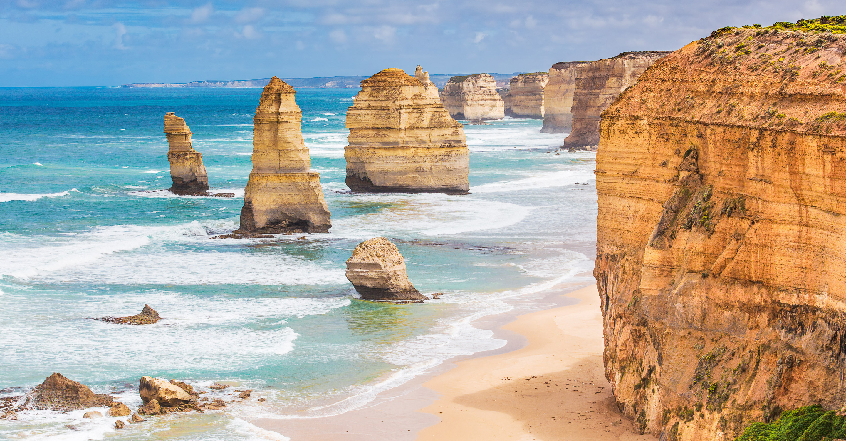 Twelve Apostles rock formations on the shore, Great Ocean Road, Victoria, Australia