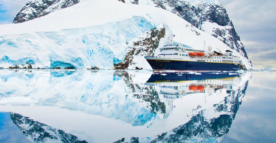 The National Geographic Explorer cruises through the Lemaire Channel, Antarctica