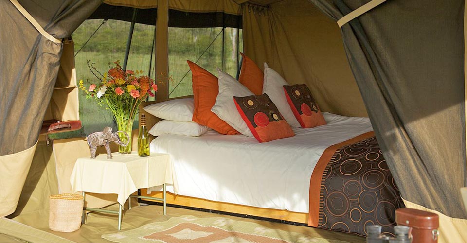 A bedroom at Natural Habitat's Migration Base Camp, Maasai Mara National Reserve, Kenya
