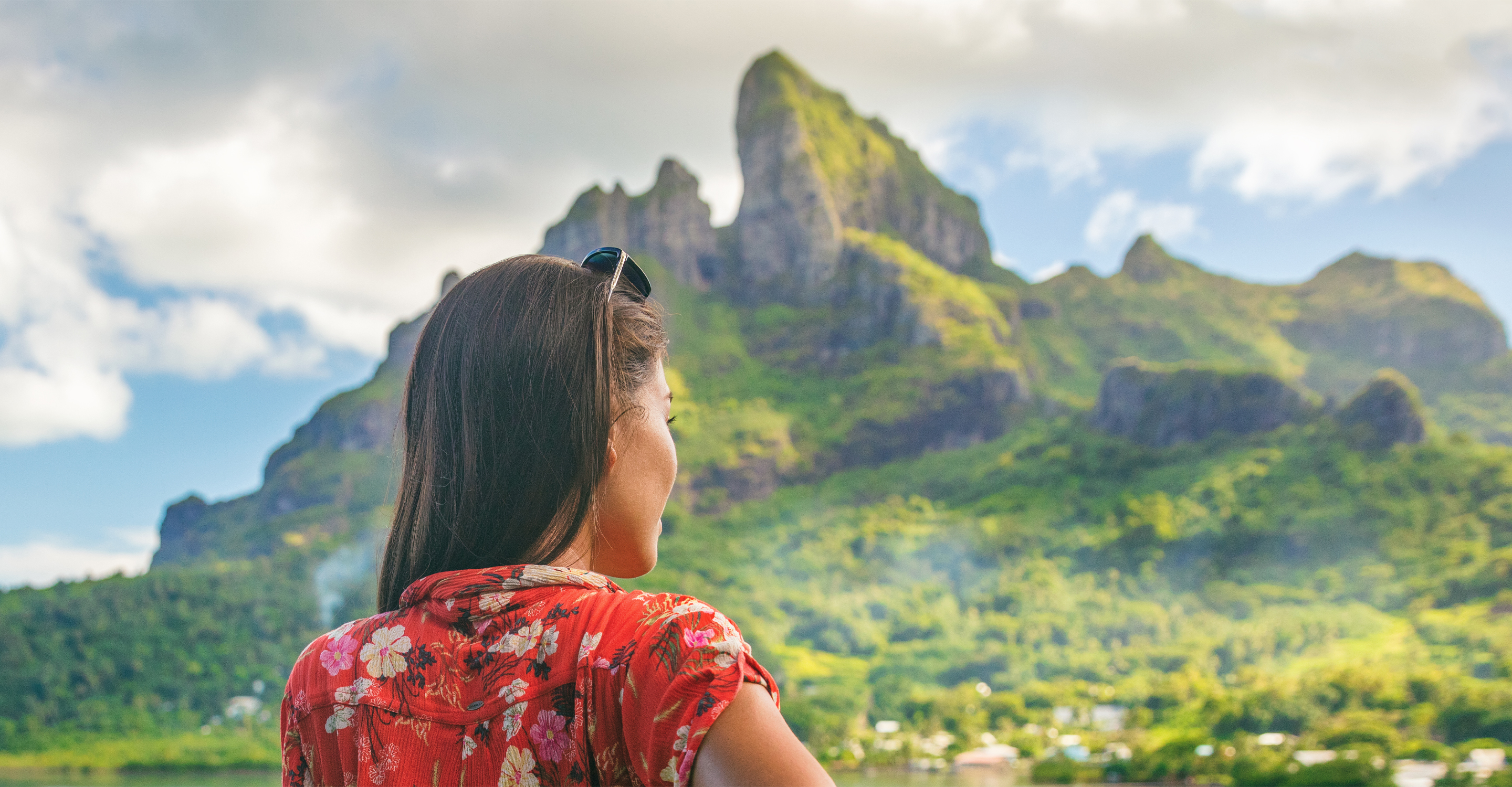 A traveler views Bora Bora island, Tahiti