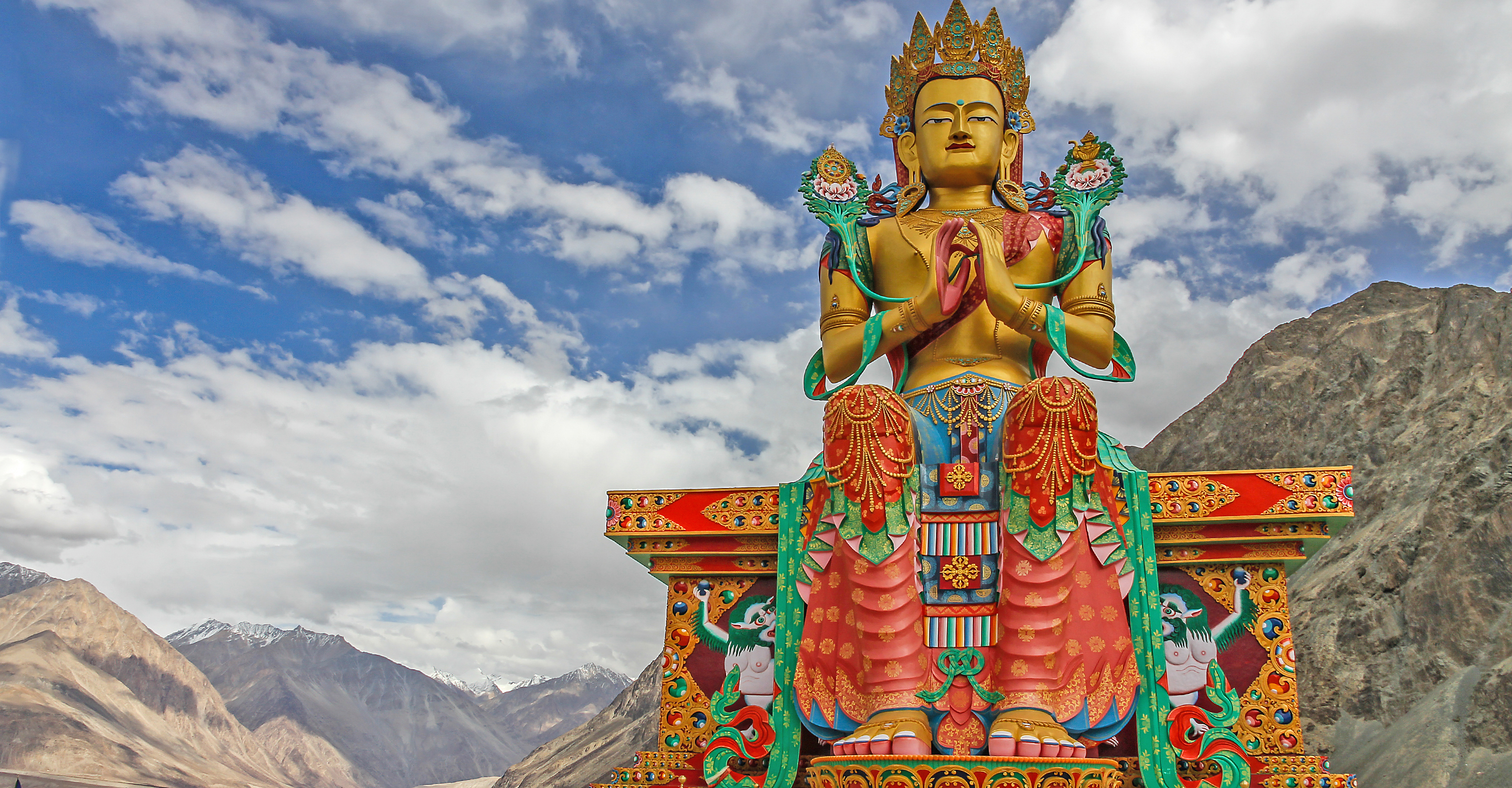 A sitting Buddha statue at the Diskit Monastery in Nubra Valley, Ladakh, India