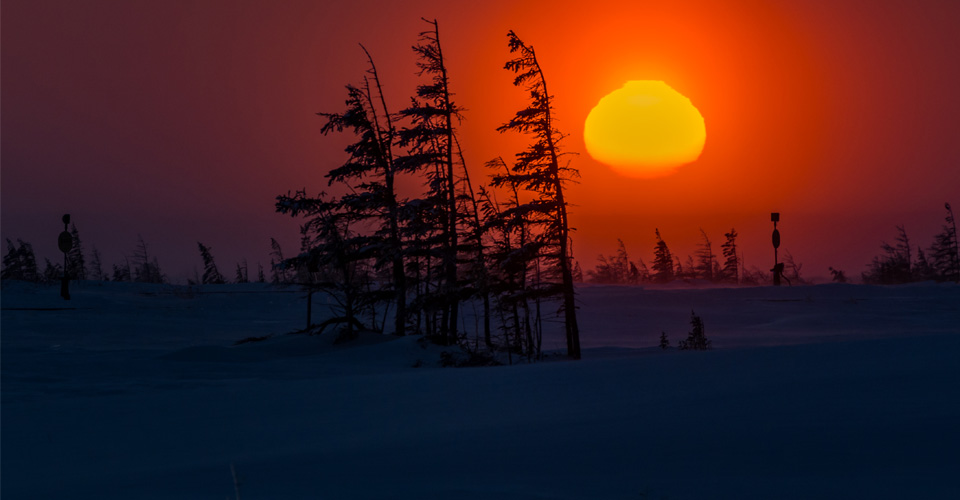 Sunset on the tundra in Churchill, Manitoba, Canada;