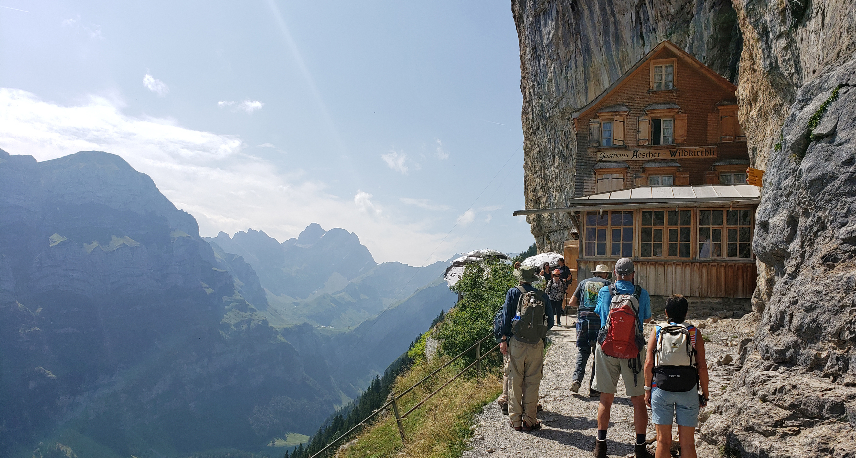 Travelers visit Aescher Wildkirchli in Wasserauen, Switzerland