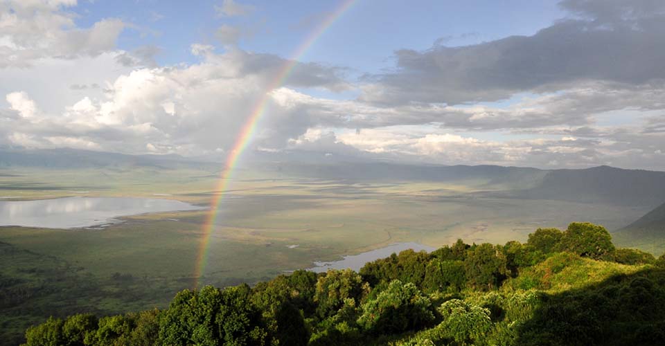 Mountain top view of Ngorongoro Crater with a rainbow, Tanzania