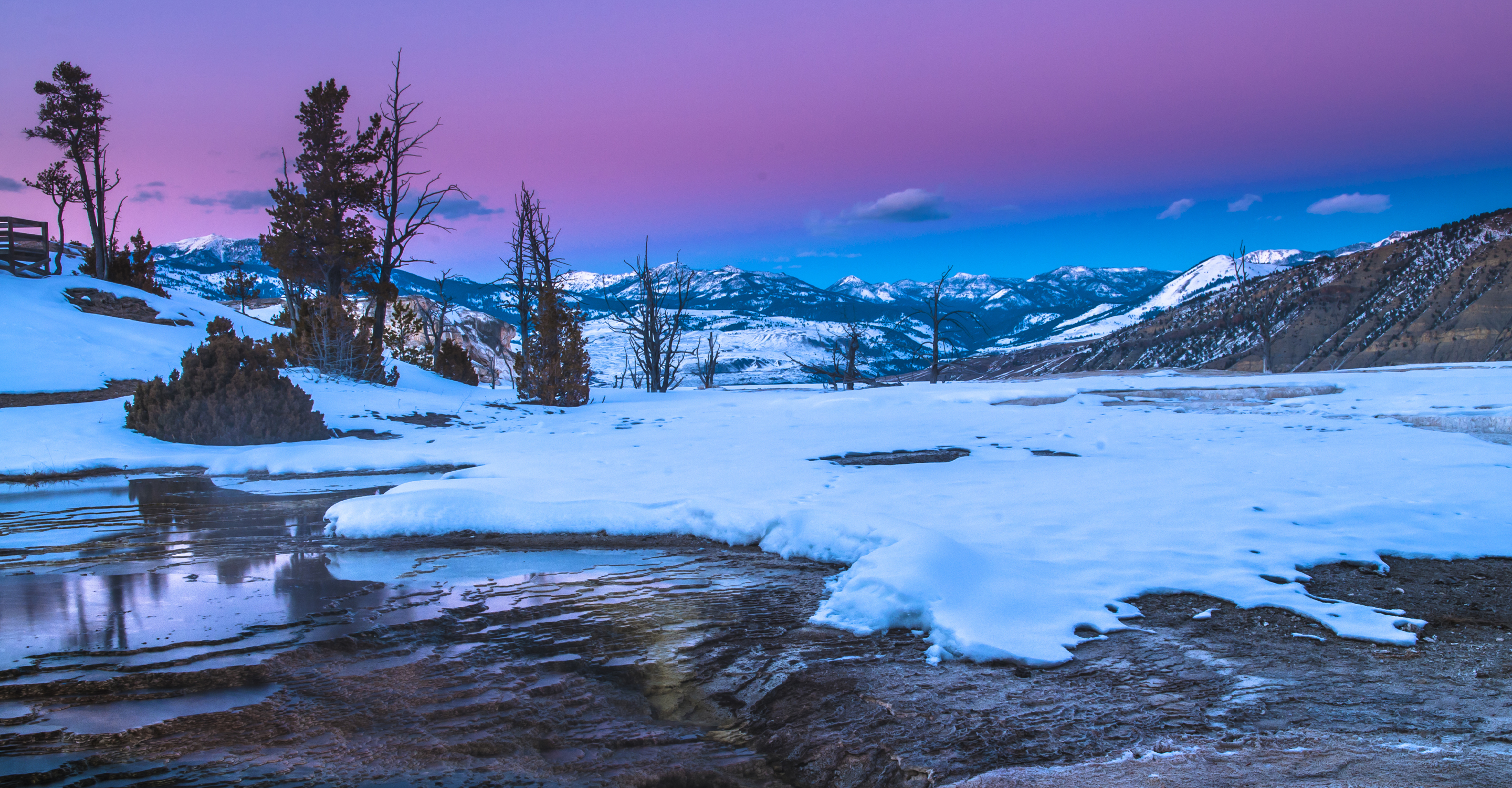 A snowy sunset in Yellowstone National Park, United States